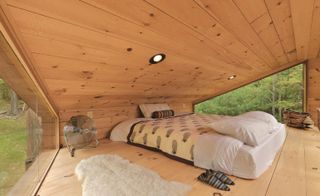 Bedroom at Inhabit tree house, NY, by Anthony Gibbon Designs, Woodstock, USA