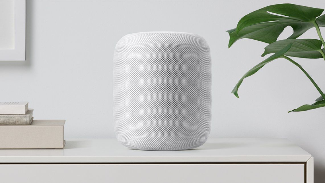 White HomePod on a dresser