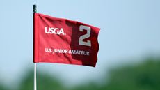 A US Junior Amateur flag in the wind