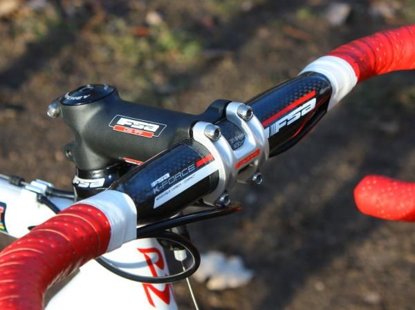 A carbon FSA K-Force Compact bar is clamped into an OS-99 forged alloy stem.
