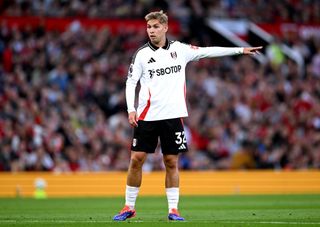 MANCHESTER, ENGLAND - AUGUST 16: Emile Smith Rowe of Fulham gestures on the pitch during the Premier League match between Manchester United FC and Fulham FC at Old Trafford on August 16, 2024 in Manchester, England. (Photo by Michael Regan/Getty Images)