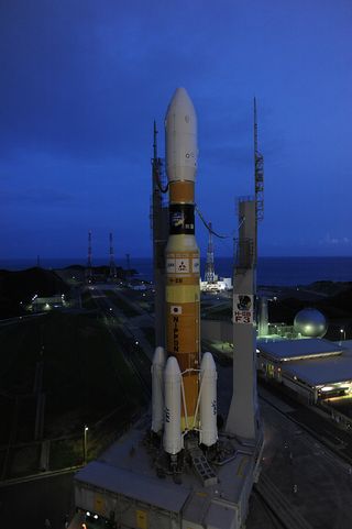 A Japanese H-2B rocket rolls out to the launch pad at Tanegashima Space Center for the July 20, 2012 launch of JAXA's H-2 Transfer Vehicle 3.