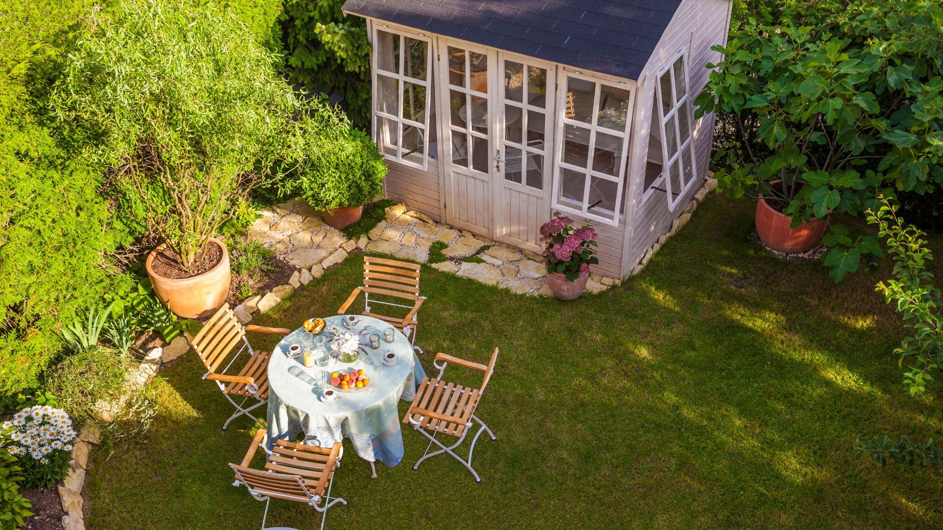 Garden laws you could be breaking - picture of outdoor dining set and shed