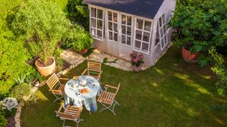 Garden laws you could be breaking - picture of outdoor dining set and shed