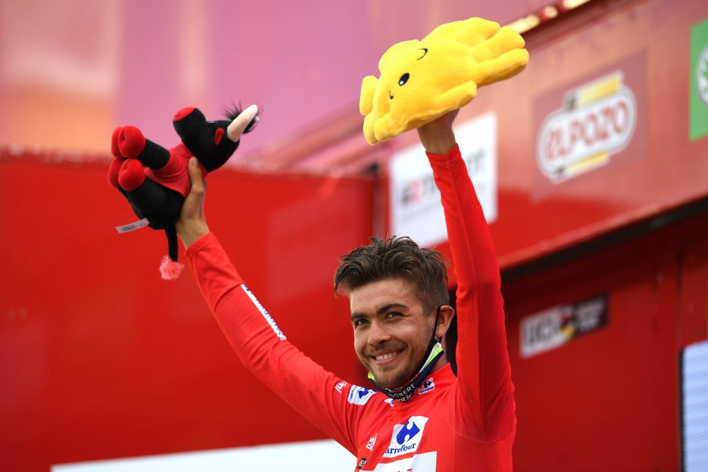 RINCON DE LA VICTORIA SPAIN AUGUST 24 Odd Christian Eiking of Norway and Team Intermarch Wanty Gobert Matriaux celebrates winning the Red Leader Jersey on the podium ceremony after the 76th Tour of Spain 2021 Stage 10 a 189km stage from Roquetas de Mar to Rincn de la Victoria lavuelta LaVuelta21 on August 24 2021 in Rincon De La Victoria Spain Photo by Tim de WaeleGetty Images