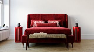 Living room with burgundy bed