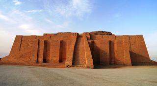 Restored ziggurat in ancient Ur, sumerian temple in Iraq.