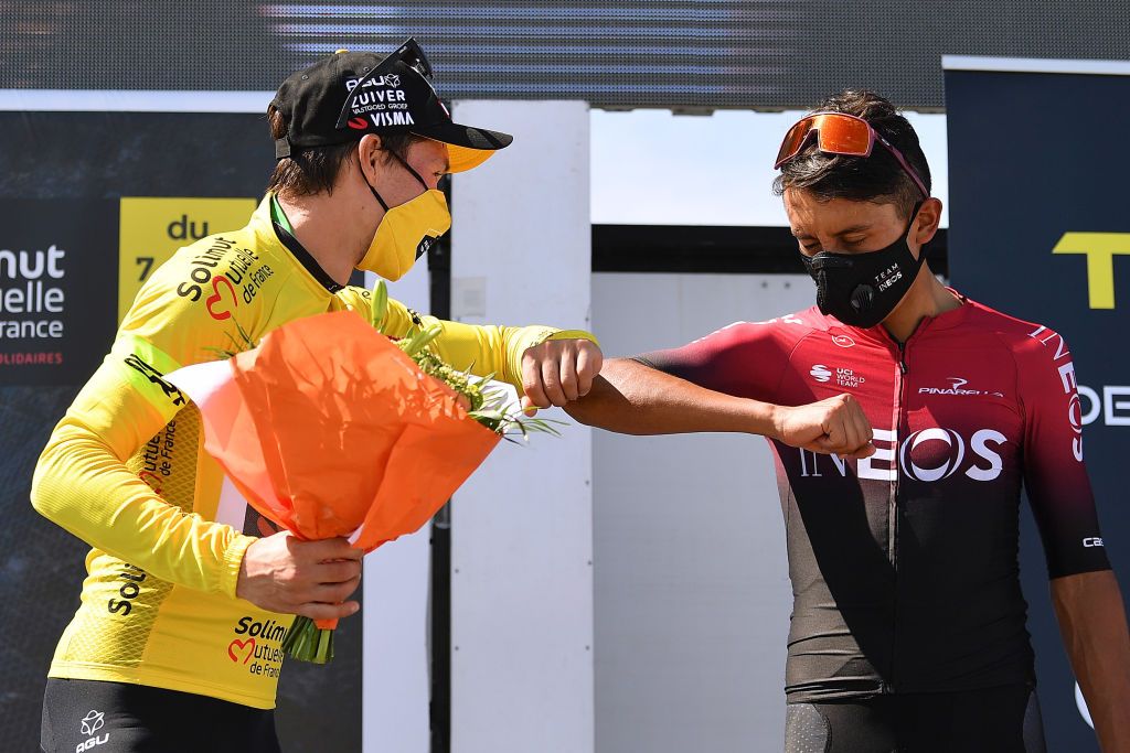 GRAND COLOMBIER FRANCE AUGUST 09 Podium Primoz Roglic of Slovenia and Team Jumbo Visma Yellow Leader Jersey Egan Arley Bernal Gomez of Colombia and Team INEOS Social distancing Mask Covid Safety Measures Celebration during the 32nd Tour de LAin 2020 Stage 3 a 145km stage from Saint Vulbas to Grand Colombier 1501m tourdelain TOURDELAIN TDA on August 09 2020 in Grand Colombier France Photo by Justin SetterfieldGetty Images