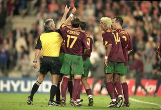 Portugal players protest as Nuno Gomes is sent off against France in the semi-finals of Euro 2000.