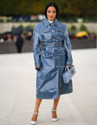 woman in a denim blue trench coat