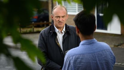 Liberal Democrat leader Ed Davey speaking to someone in Mid Bedfordshire constituency