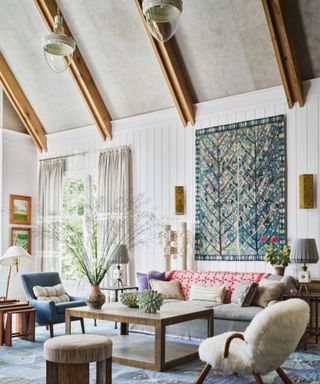 Rustic living room with high beamed ceilings