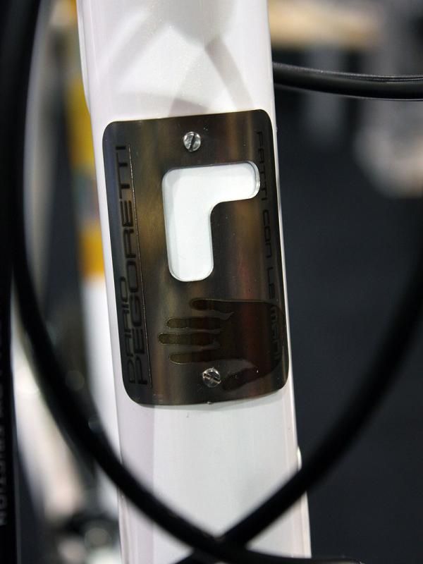 The hand on Pegoretti's down tube emphasizes the handbuilt construction