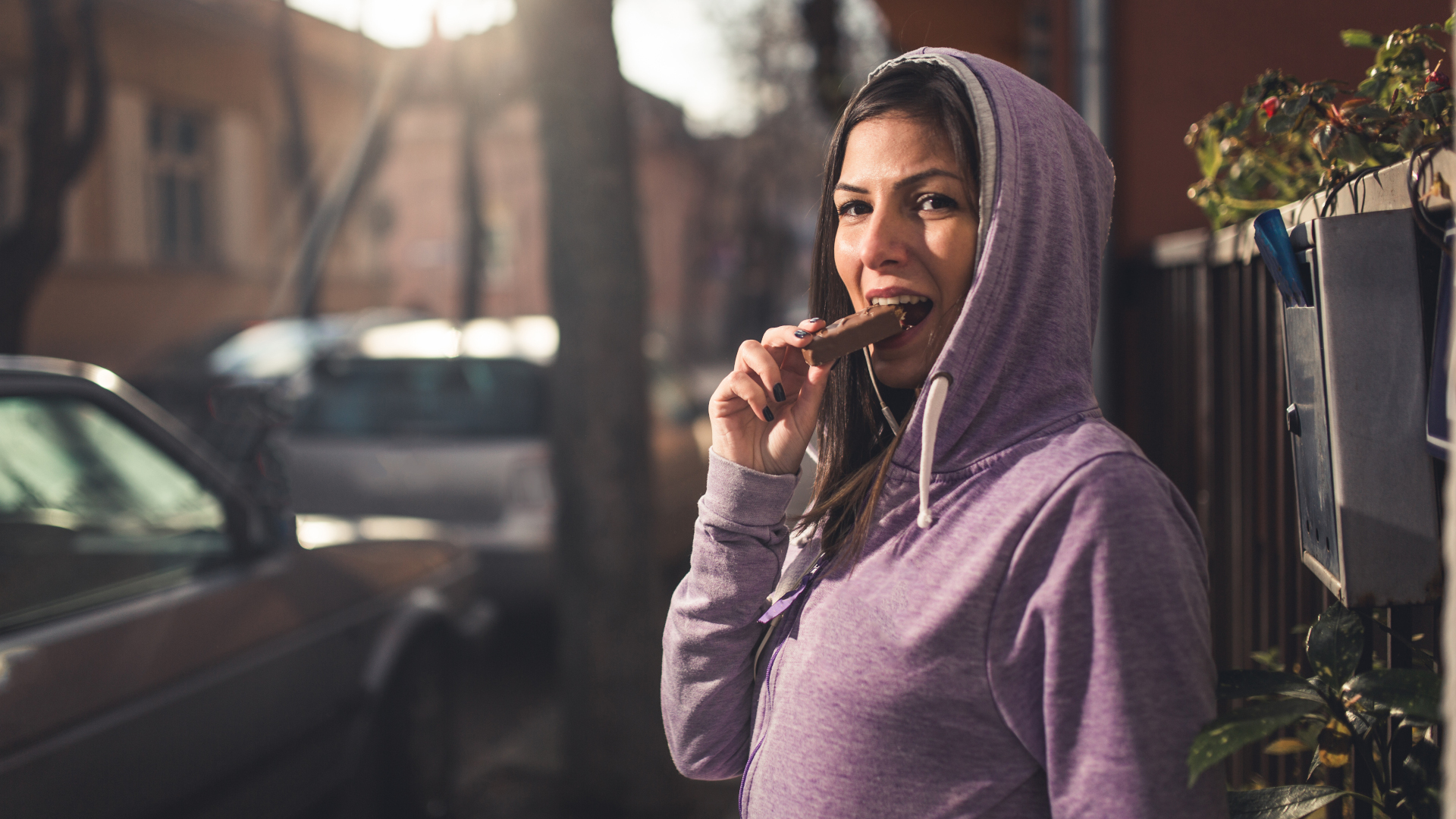 I've cut UPF: Woman enjoying chocolate after a run