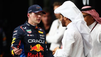 Max Verstappen talks to FIA president Mohammed Ben Sulayem