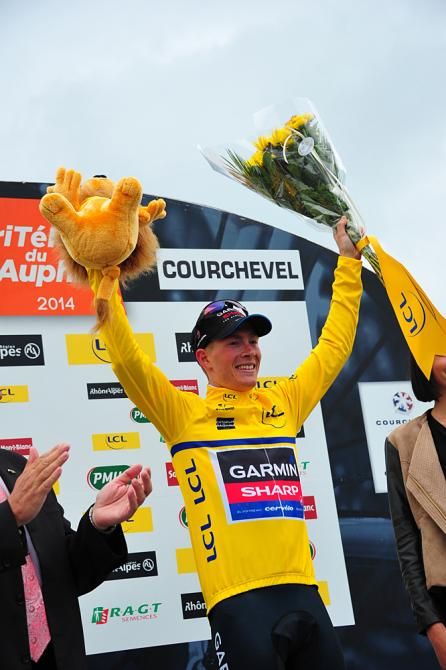 Andrew Talansky (Garmin-Sharp) throws his arms up on the final podium
