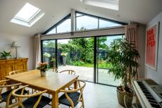 External sliding doors out onto patio from open dining room spac