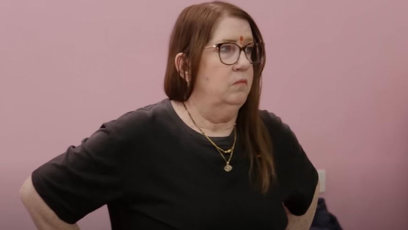 Jenny looking at Sumit&#039;s mother