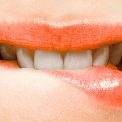 Lip, Skin, Eyelash, Tooth, Orange, Organ, Tints shades, Photography, Close-up, Material property, 