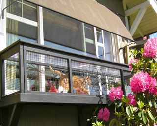 A balcony catio at the back of a home
