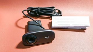 Logitech C310 HD Webcam with cord and manual
