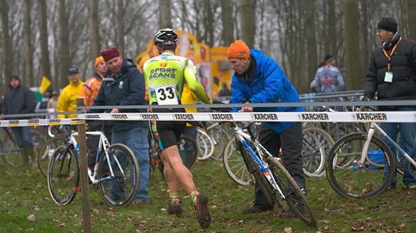Jeremy Powers gets a fresh Orbea from Geoff Proctor at Wachtebeke, Belgium.