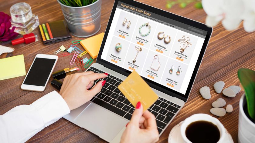 woman buying something on a credit card from Etsy