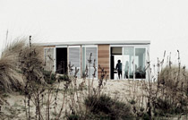 A modular wooden-framed canvas covered shelter