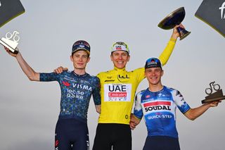 NICE FRANCE JULY 21 LR Jonas Vingegaard Hansen of Denmark and Team Visma Lease a Bike on second place race winner Tadej Pogacar of Slovenia and UAE Team Emirates Yellow Leader Jersey and Remco Evenepoel of Belgium and Team Soudal QuickStep on third place pose on the final podium ceremony after the 111th Tour de France 2024 Stage 21 a 337km individual time trial from Monaco to Nice UCIWT on July 21 2024 in Nice France Photo by Tim de WaeleGetty Images