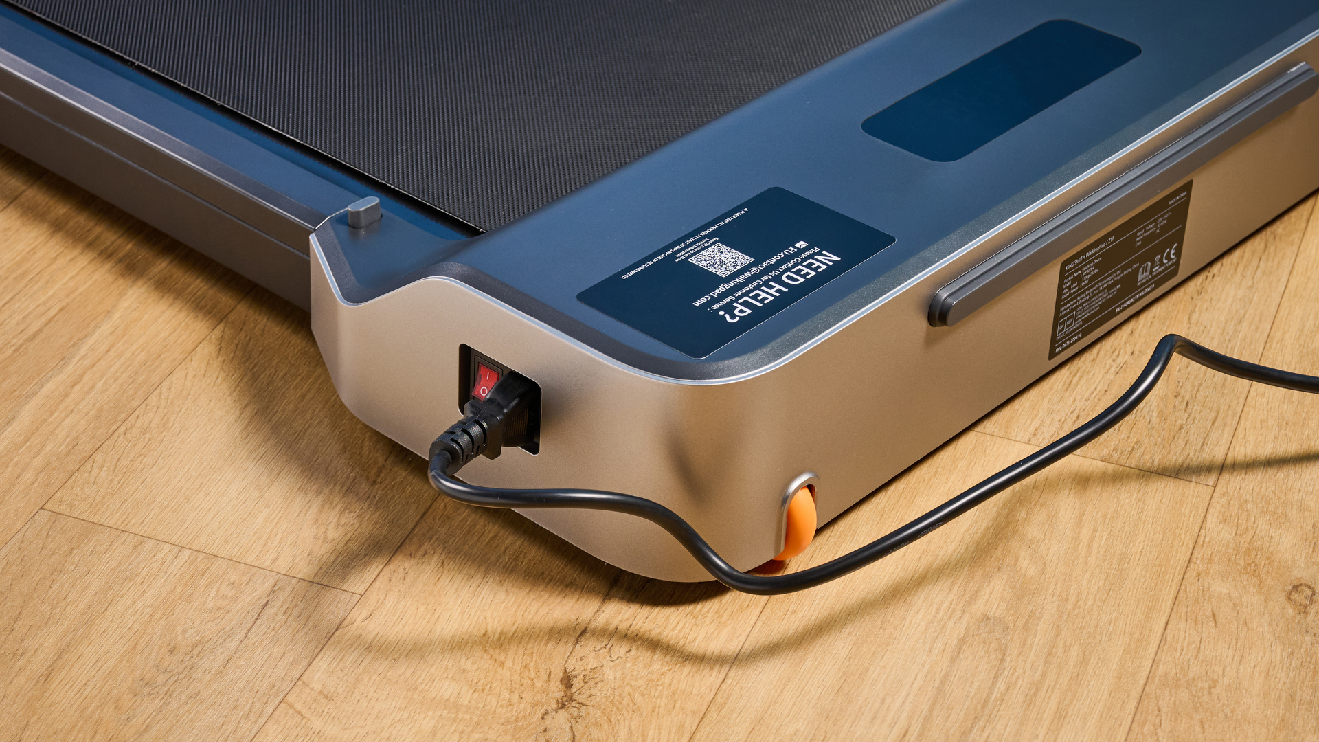 The WalkingPad Z1 photographed in front of a blue background.