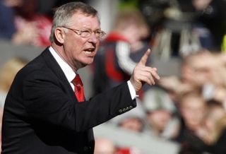 Sir Alex Ferguson makes a point to his players in a game against Liverpool at Anfield in March 2007.