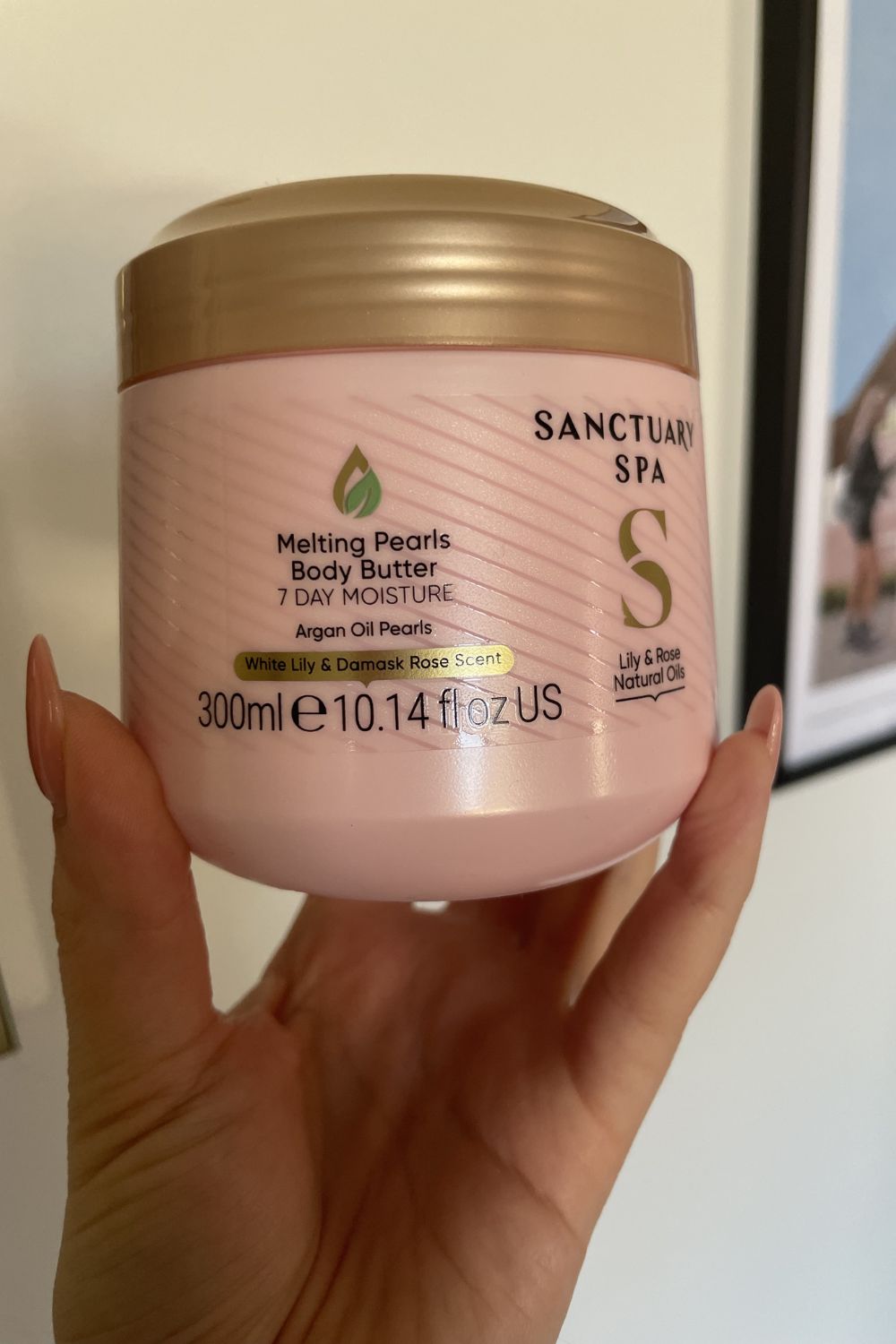 valeza holding the Sanctuary Spa Melting Pearls Body Butter