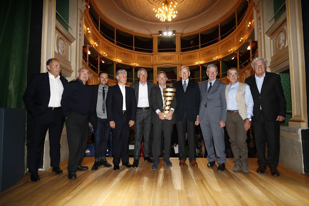 Bernard Hinault on stage with Gianni Motta, Gilberto Simoni, Giuseppe Saronni, Mauro Vegni, Francesco Moser, Felice Gimondi