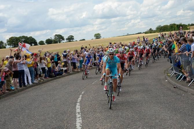 Astana leads the Tour de France through huge crowds on stage 3
