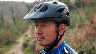 A mountain biker in a helmet