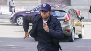 Torres running down the street on NCIS