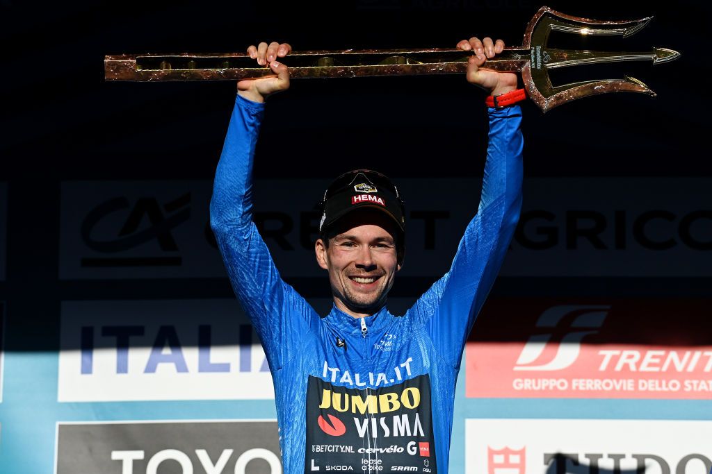 Primož Roglič holds Tirreno&#039;s trident trophy aloft