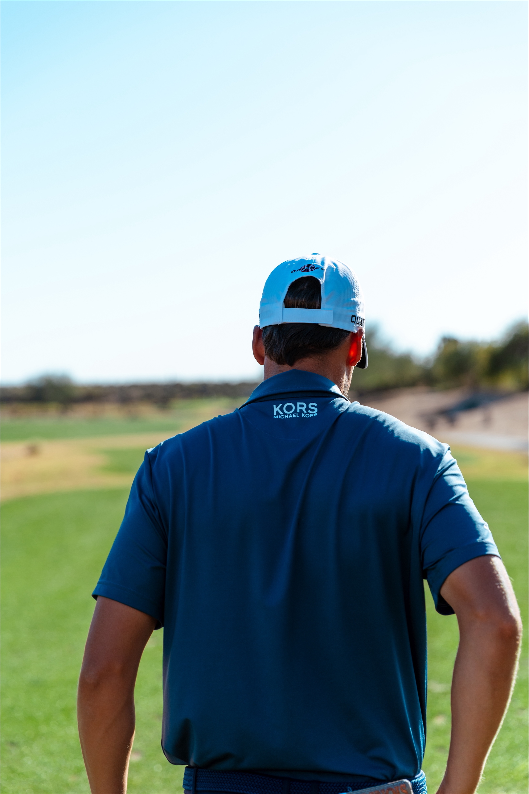 New Michael Kors Golf Ambassador ADRIEN DUMONT DE CHASSART wearing Michael Kors apparel.