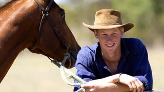 Prince Harry wearing a cowboy hat