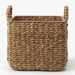 A woven basket with two handles