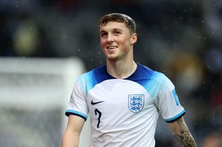 Alfie Devine of England smiles during the FIFA U-20 World Cup Argentina 2023 Group E match between Uruguay and England at Estadio La Plata on May 25, 2023 in La Plata, Argentina.