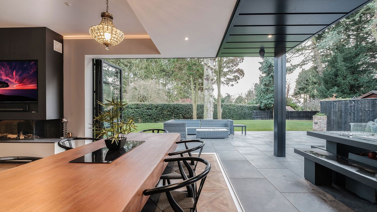 sliding doors in contemporary kitchen diner