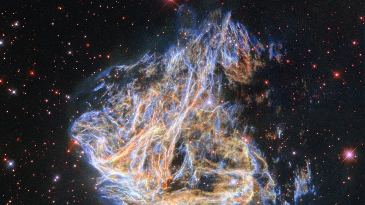 Cosmic Clouds Part to Reveal Dazzling Space Fireworks