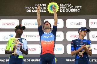 QUEBEC CITY QUEBEC SEPTEMBER 13 LR Biniam Girmay of Eritrea and Team Intermarche Wanty on second place race winner Michael Matthews of Australia and Team Jayco AlUla and Rudy Molard of France and Team Groupama FDJ on third place pose on the podium ceremony after the 13th Grand Prix Cycliste de Quebec 2024 a 2016km one day race from Quebec City to Quebec City UCIWT on September 13 2024 in Quebec City Quebec Photo by Alex BroadwayGetty Images