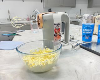 Image of Oster mixer in completed whipped cream test