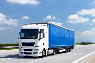 Lorry driving down motorway