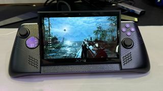 XPG NIA Gaming Handheld playing first-person shooter game at Computex 2024.