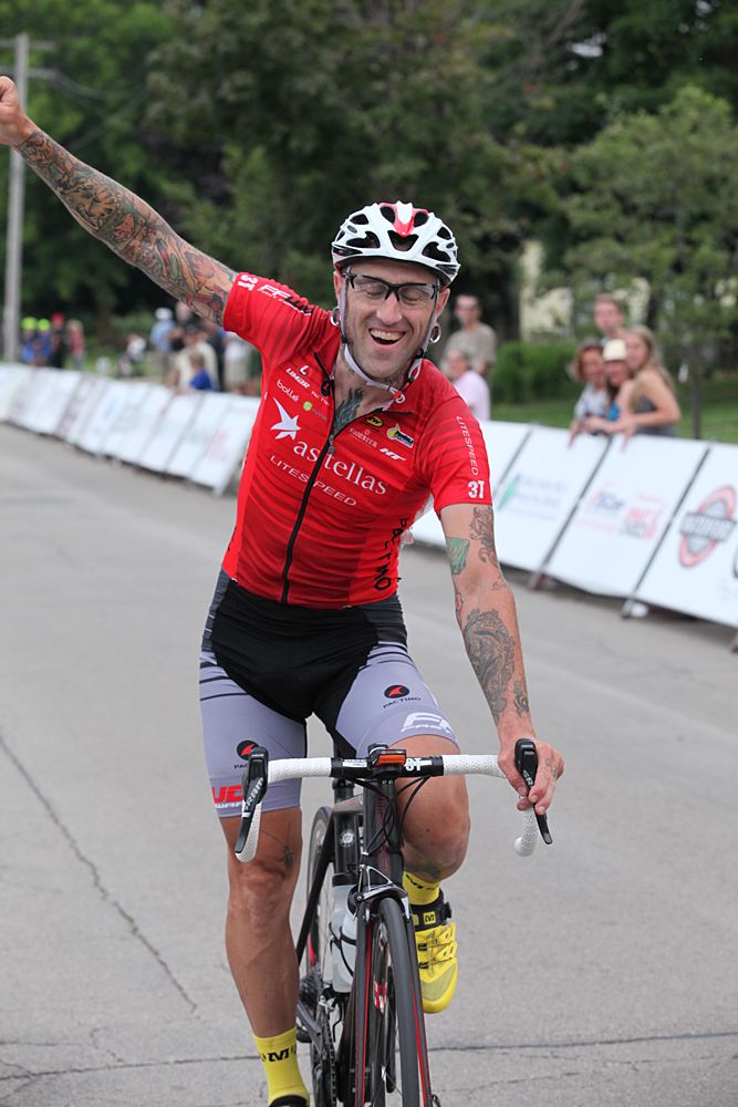 Adam Myerson (Astellas) celebrates his win in the Neenah Criterium