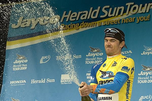 Chris Sutton (Garmin-Slipstream) sprays the champers on the podium in Apollo Bay after taking over the tour lead.