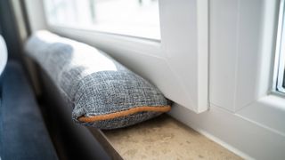 grey window draught excluder